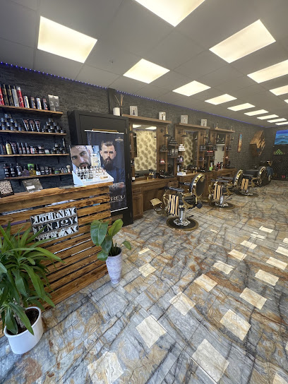 Interieur van Nobar Barber in Hengelo met barberstoelen en verzorgingsproducten